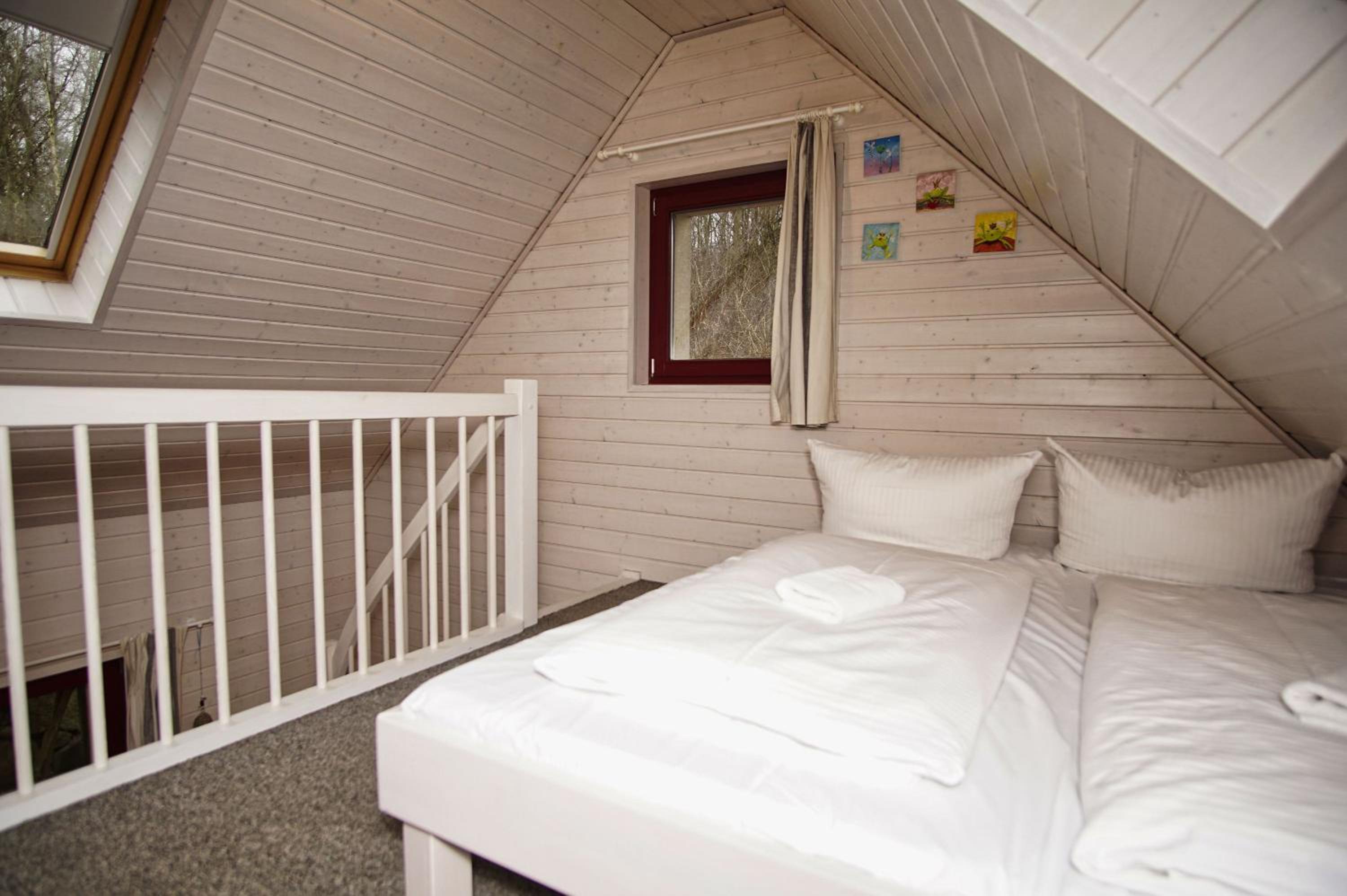 idyllische Lage, eigene Fasssauna, Kamin und Terrasse - Ferienhaus Rotkäppchen