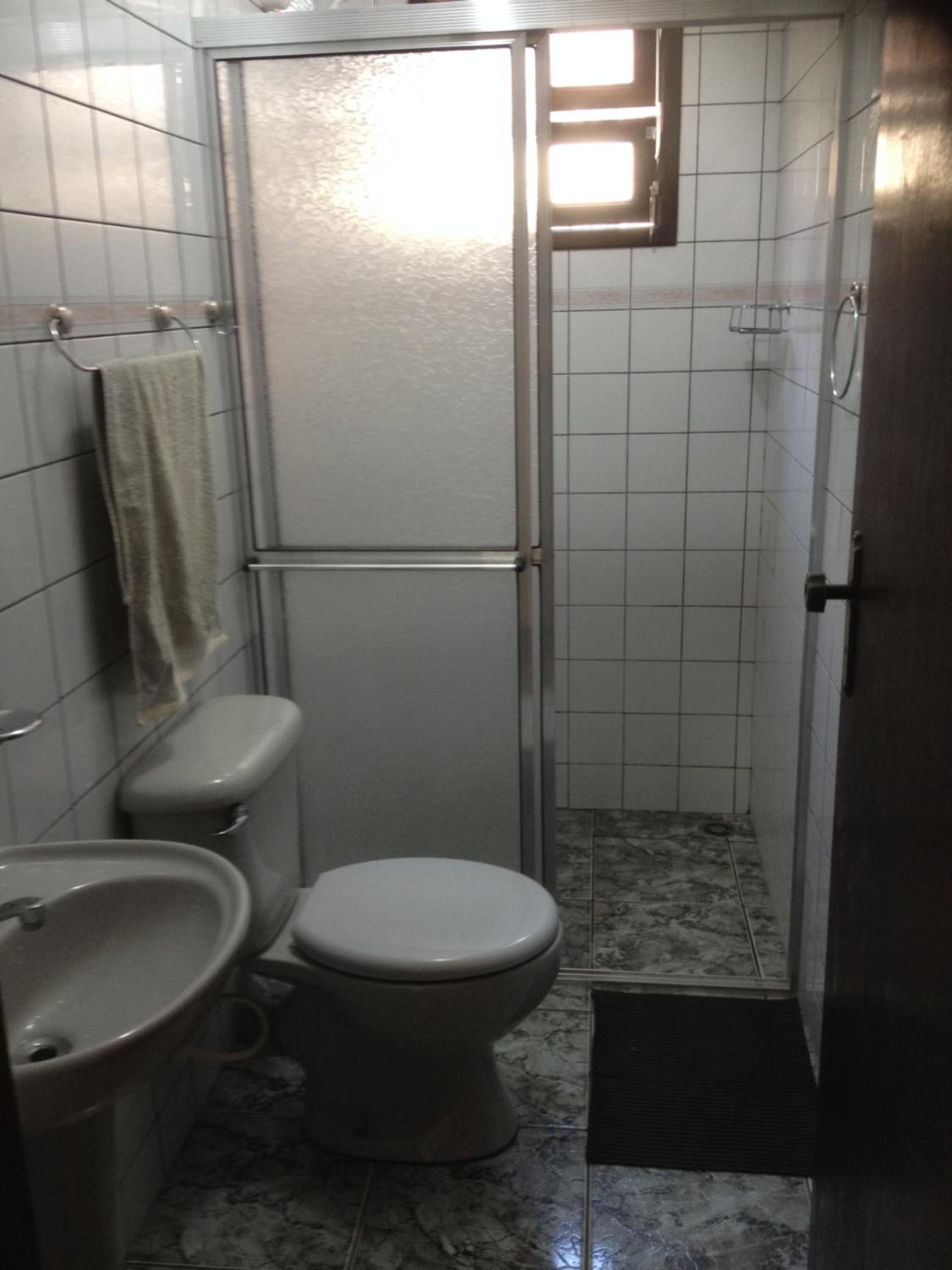 Casa confortável p 13 praia Itaguá Ubatuba
