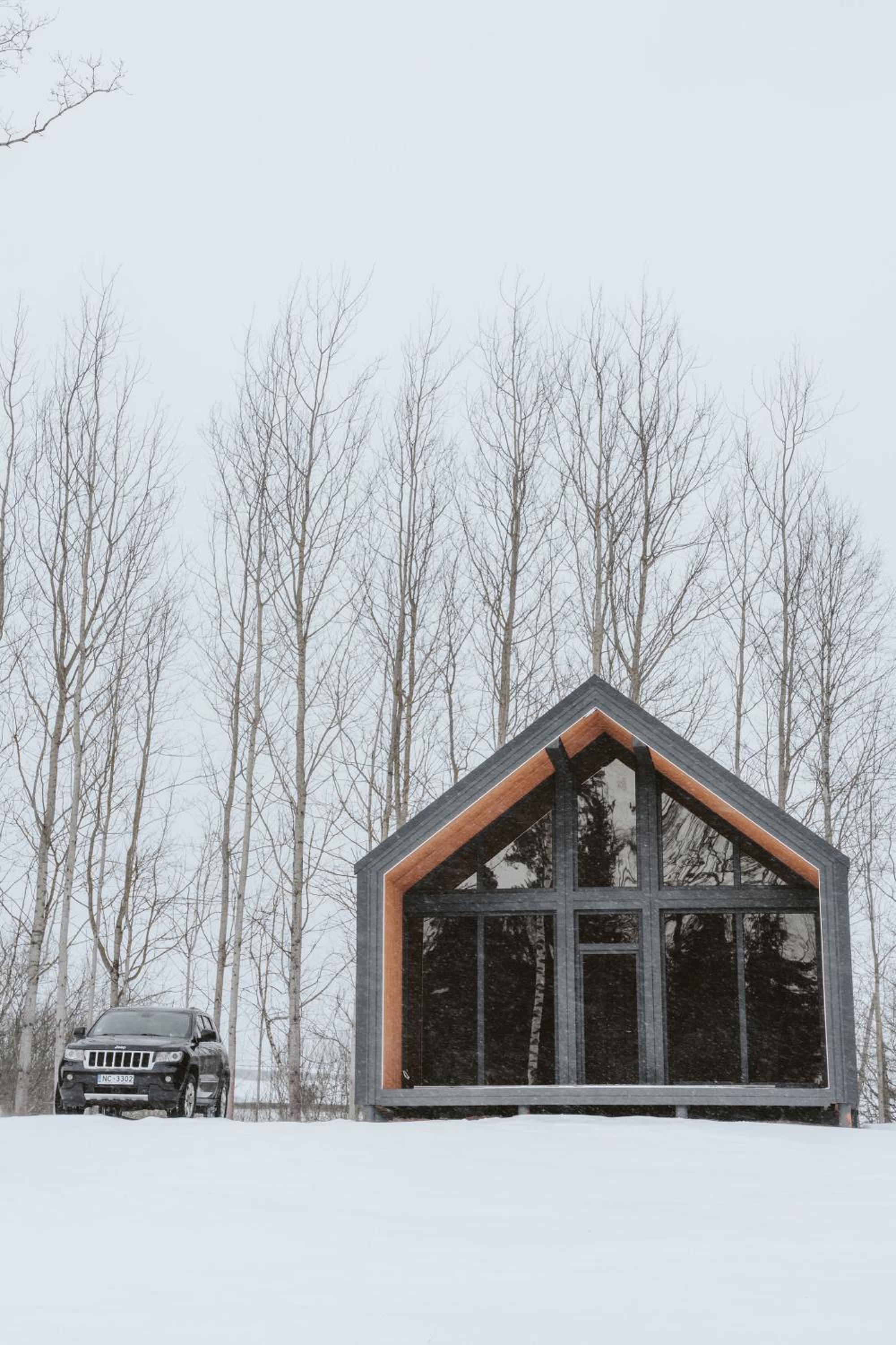 Sniegi design cabin with sauna view 2