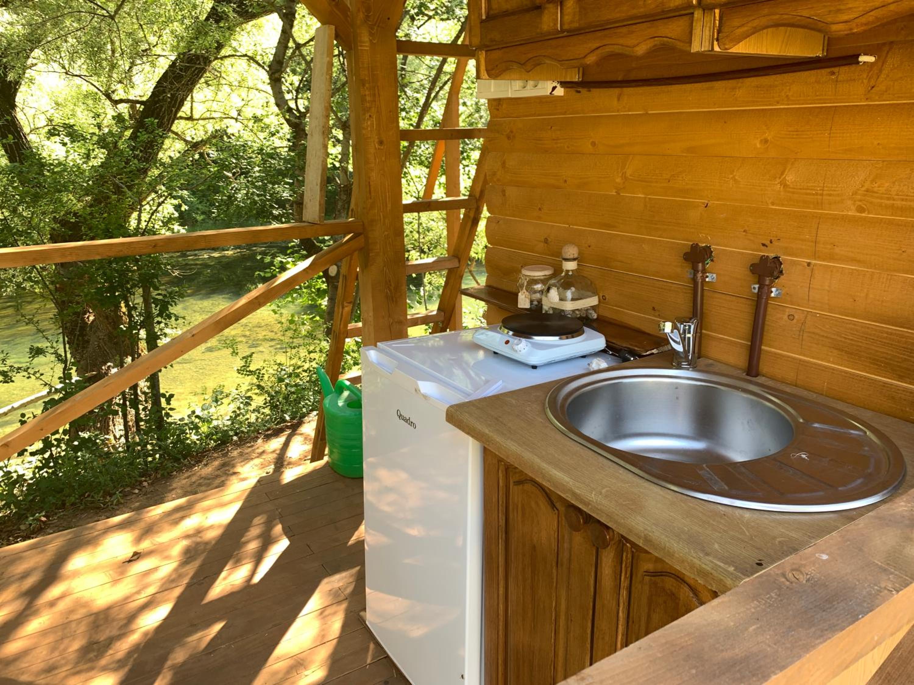 Cozy Treehouse with private sand beach