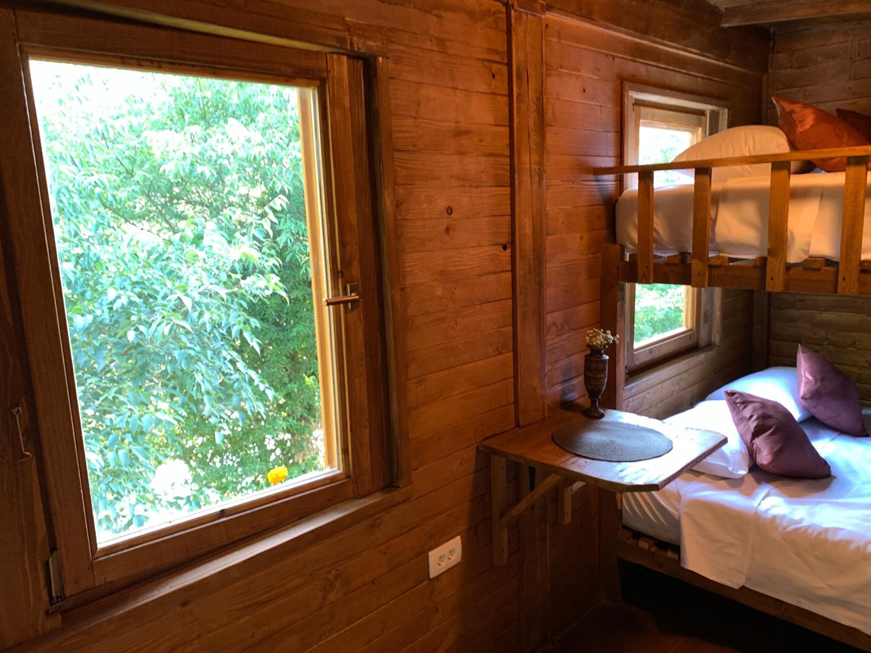 Cozy Treehouse with private sand beach