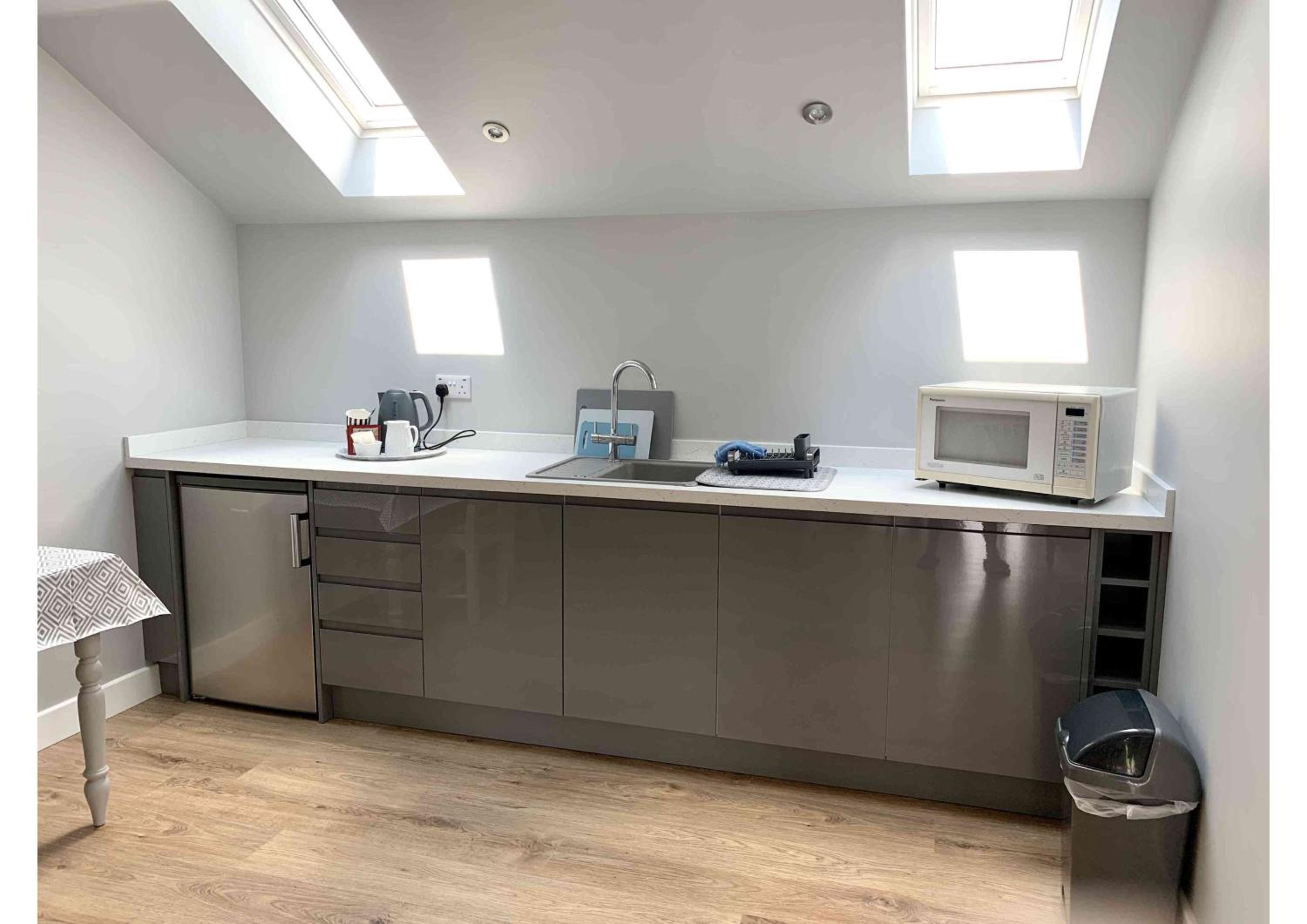 Acorn Attic, a modern, new first floor garden annex view 3
