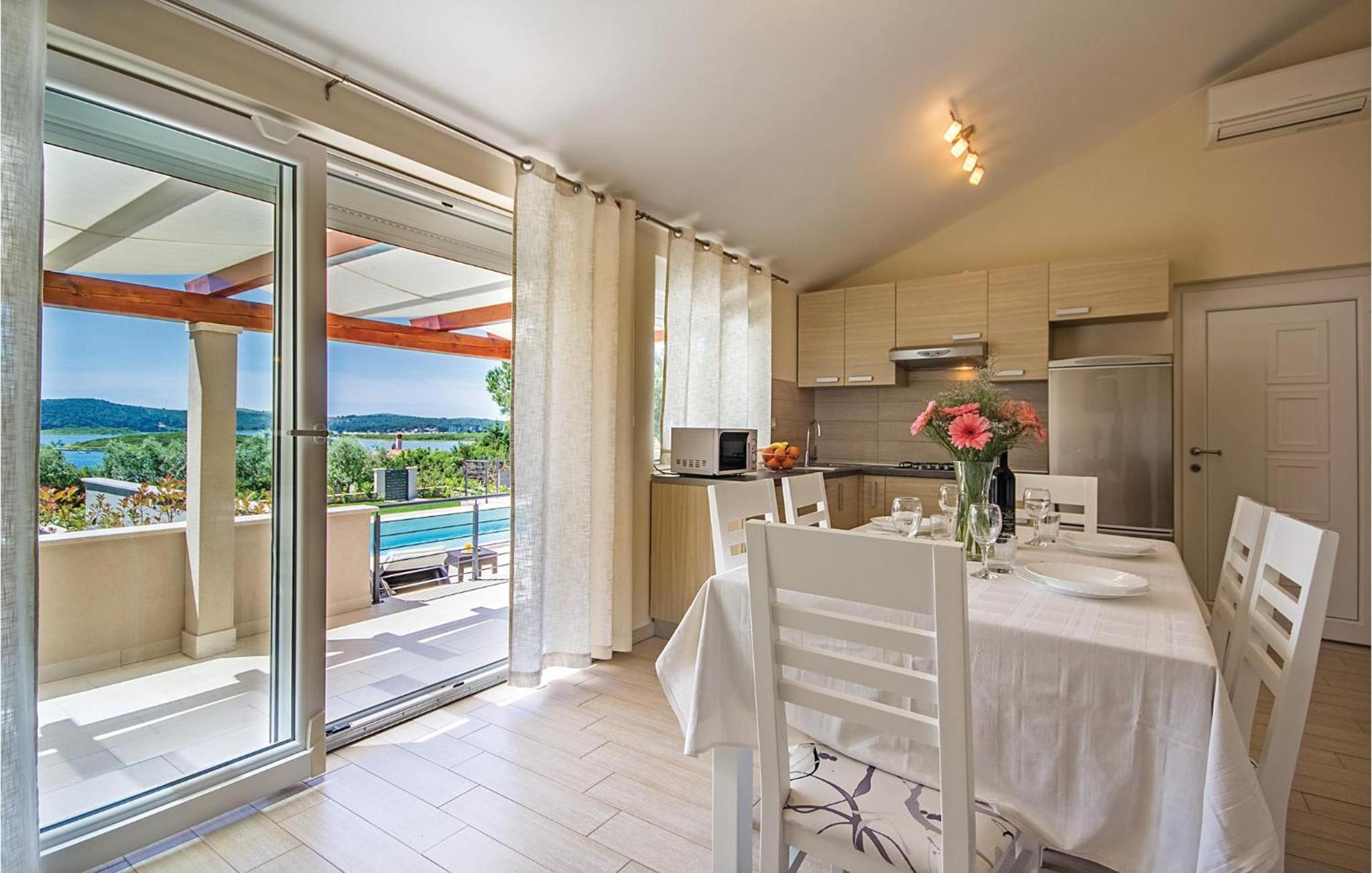 Two-Bedroom Holiday Home In Pomer view 3