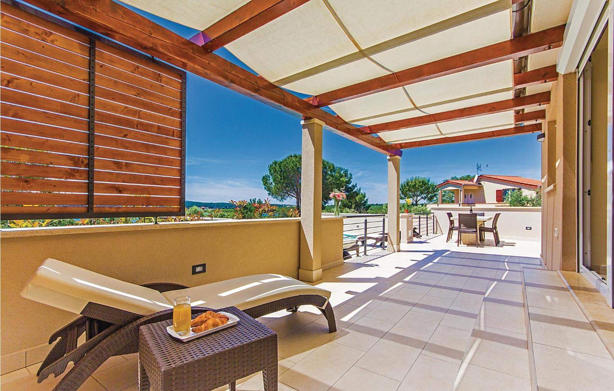 Two-Bedroom Holiday Home In Pomer view 5