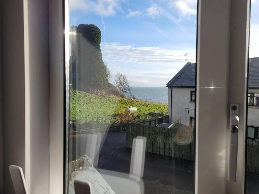 Cottage by the sea Greencastle view 5