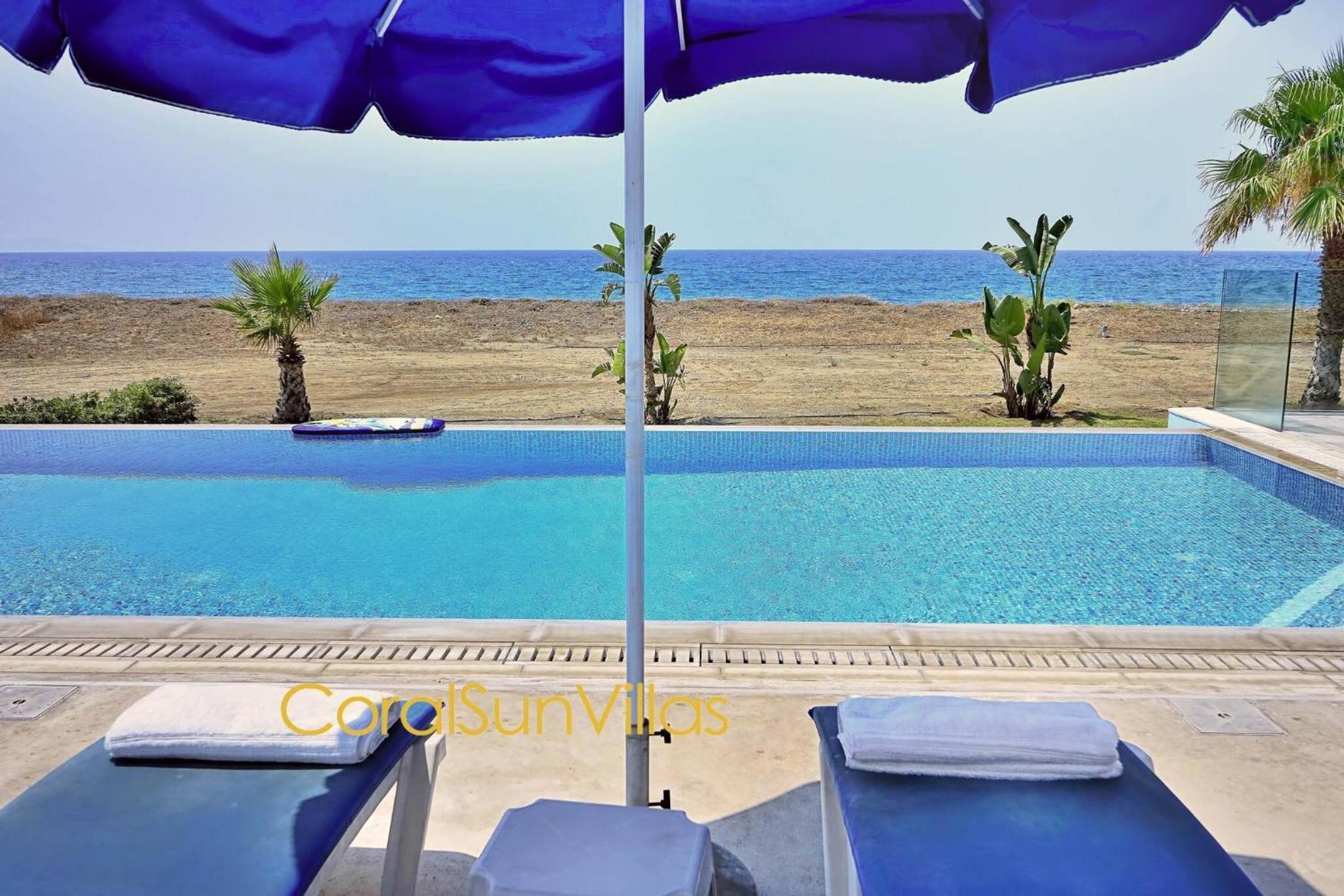 Blue - Beach Front Spectacular Villa Sleeps 10