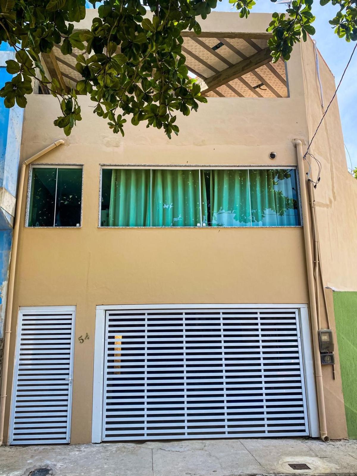 Casa com pes na areia em Iriri - ES