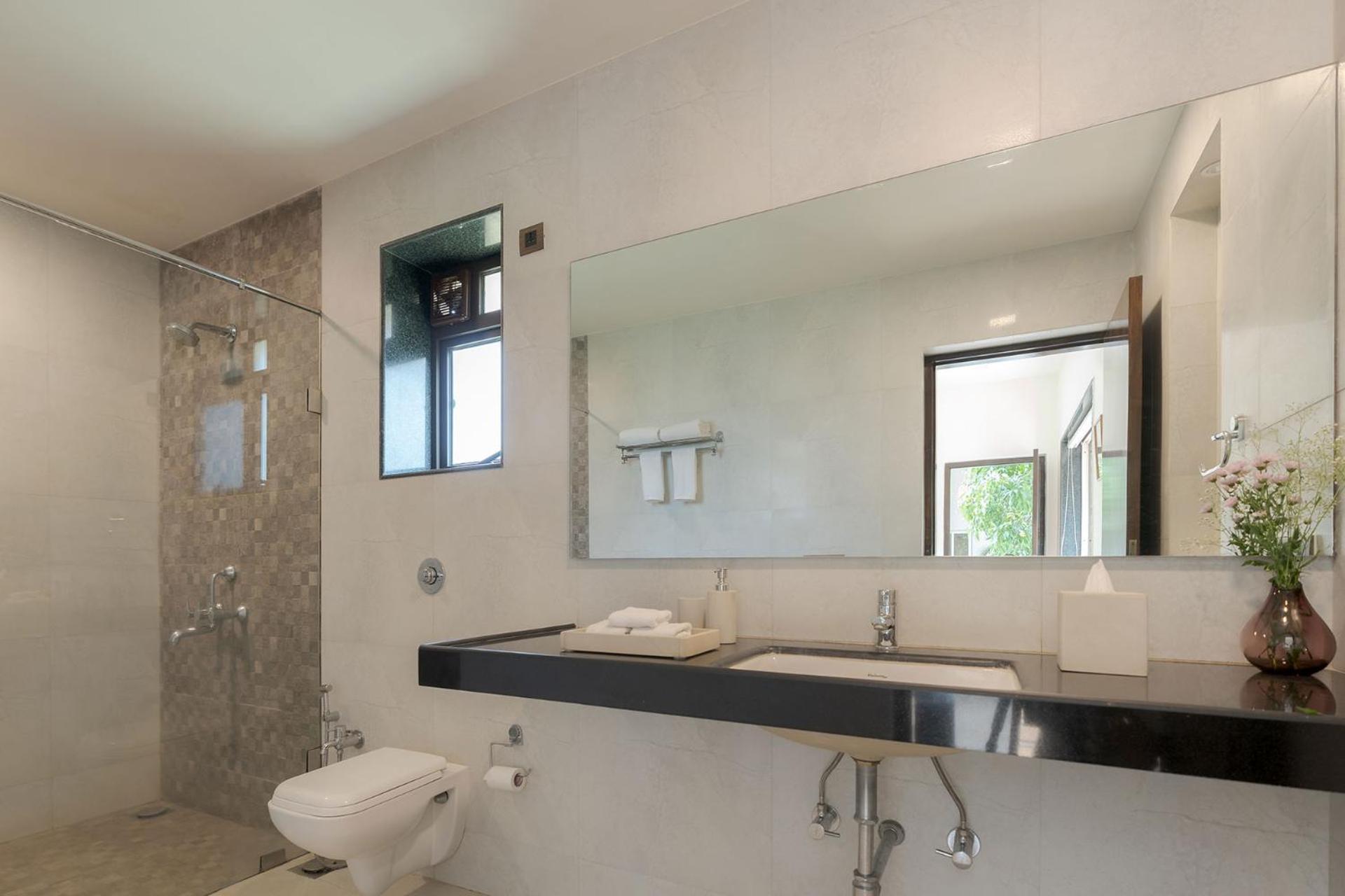 The Leaf by StayVista - An enchanting escape offering a pool, terrace, lush lawn, contemporary interiors, and indoor games view 5