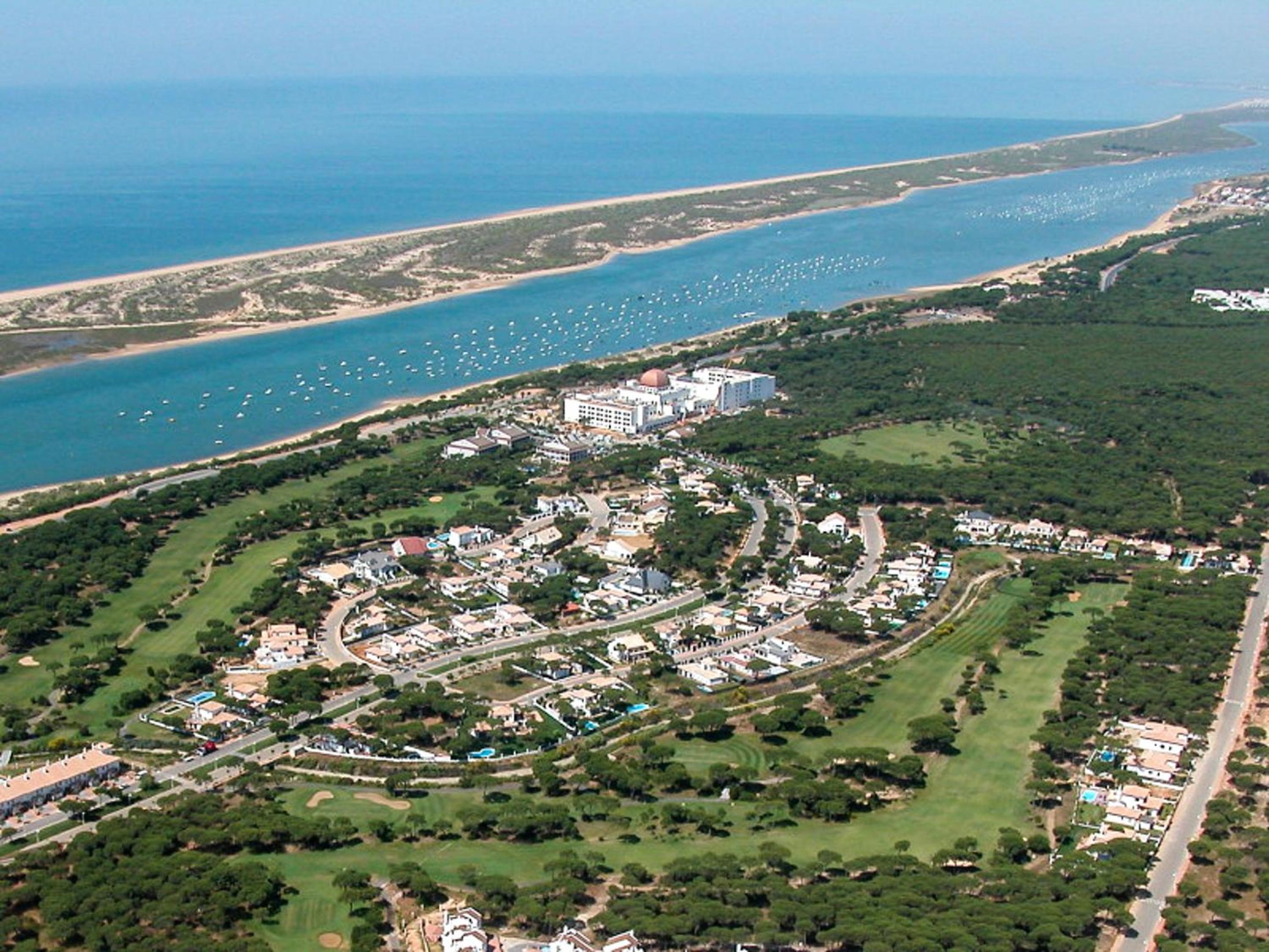 Elegant Villa in Nuevo Portil with Shared Pool
