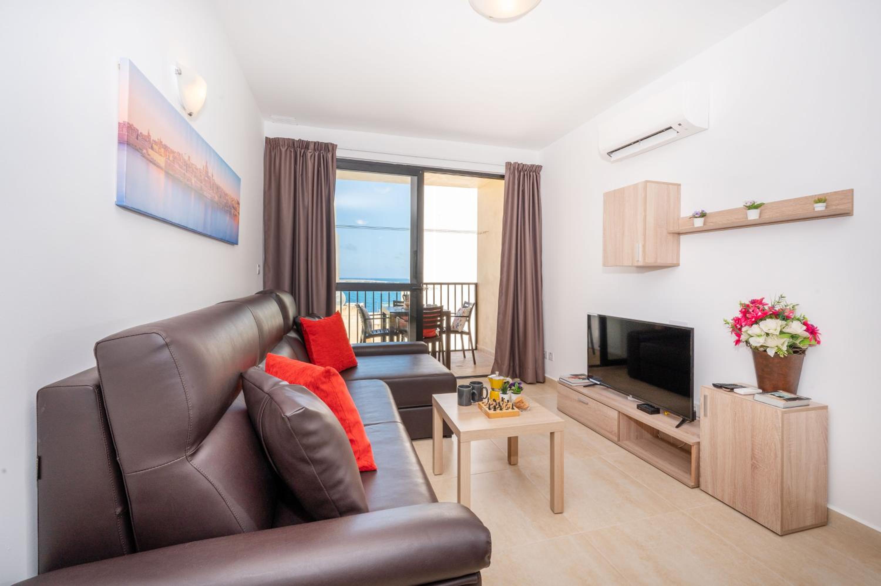 Sea Bliss Apartments with terrace just off seafront in St Paul's Bay - By Getawaysmalta photo 3