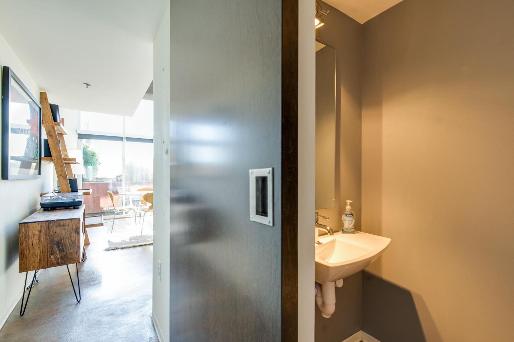 Artsy Chic 1BR Condo 30day min with WiFi AC Parking TV Furnished Rooftop view 4