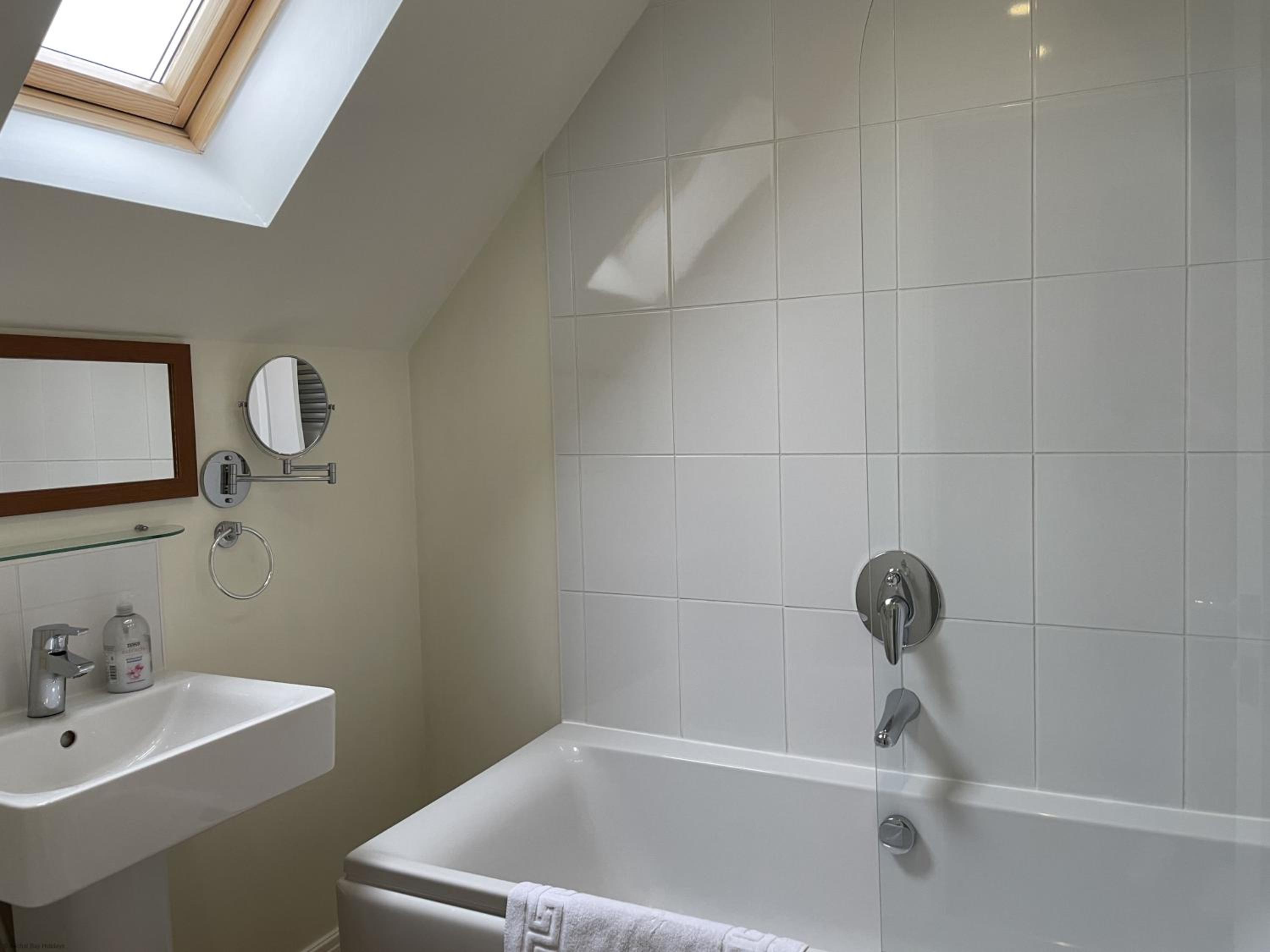 High Tide Cottage - Part of the The Bay Filey Holiday Village with pool, gym and direct beach access, pub, restaurant, tennis and meadows walks