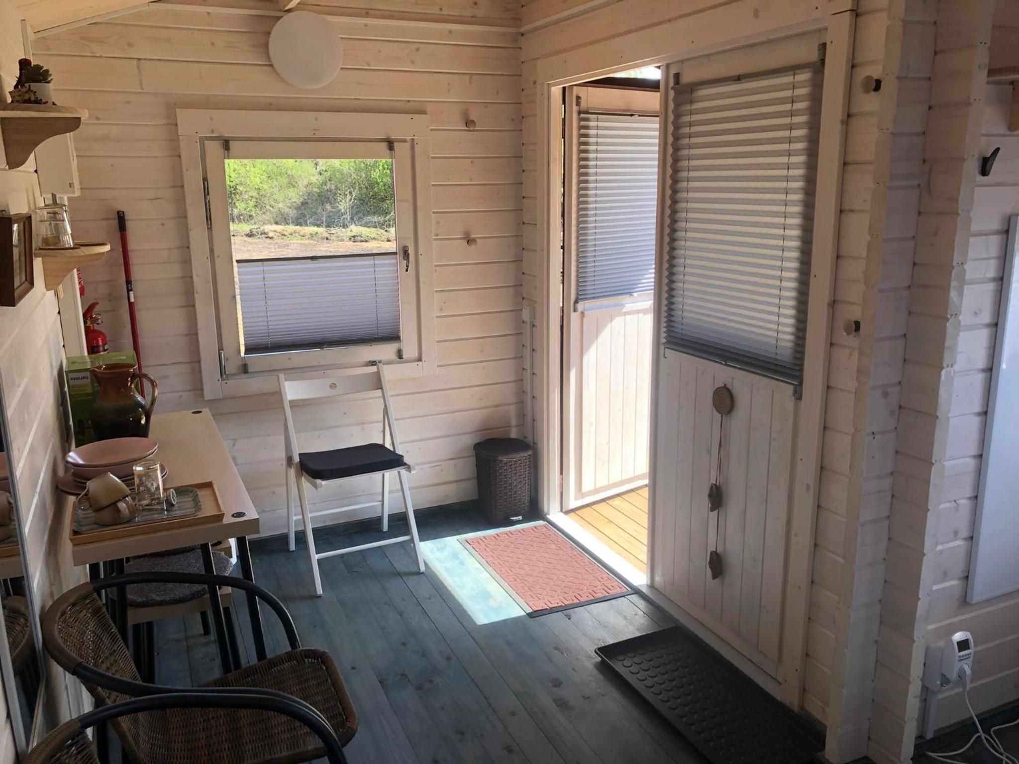 WOMOCAMP Holzhütte 2 with shared WC view 4