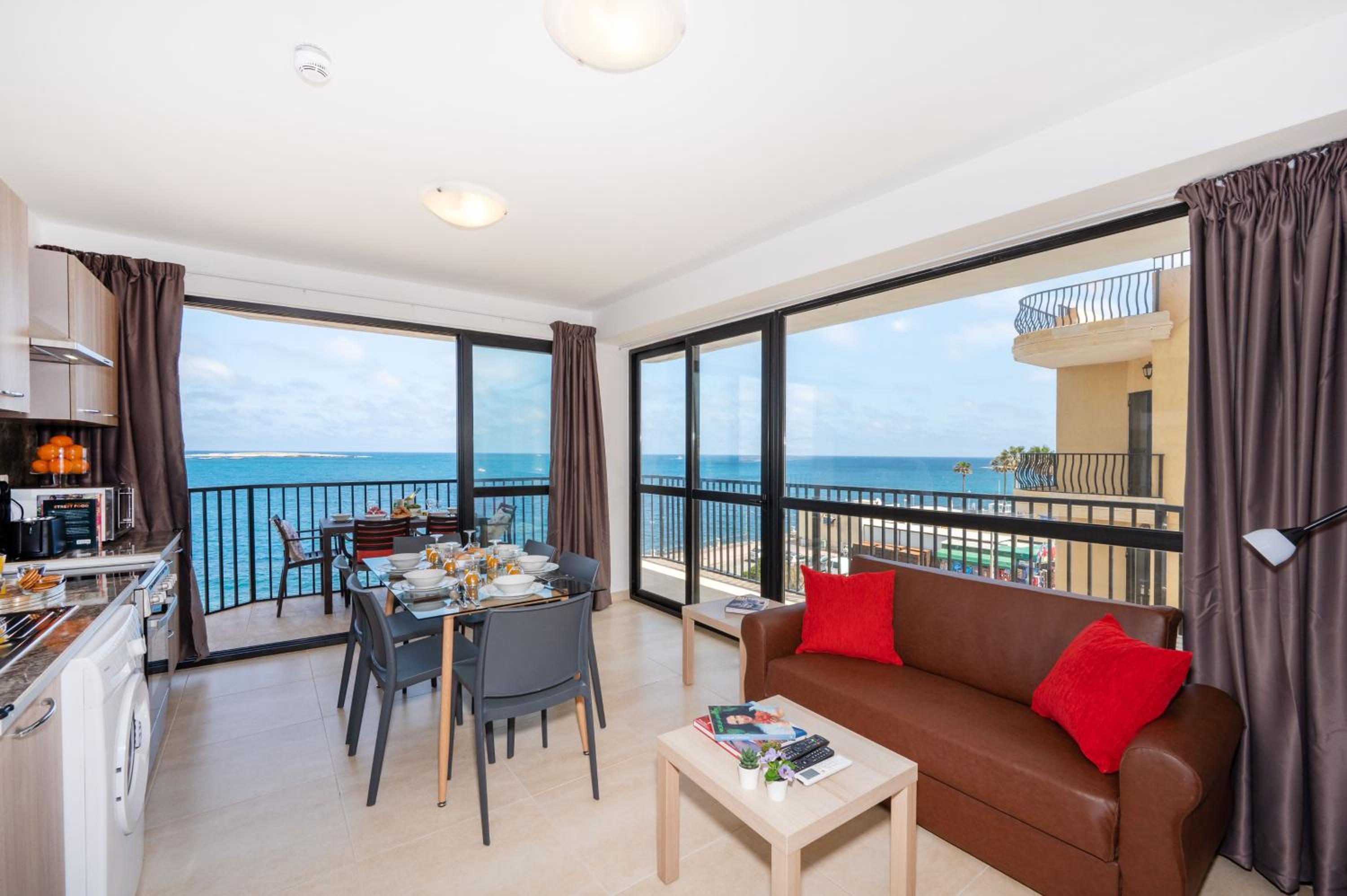 Islet Promenade Seafront Apartment with large Corner Terrace by Getawaysmalta photo 3