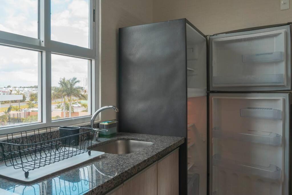 DR02 Departamento Moderno con Vista a la Laguna en Dream Lagoons