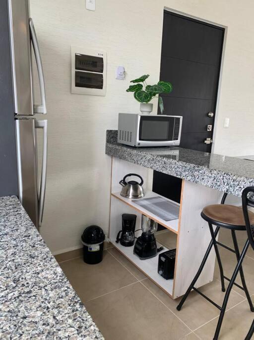 DR02 Departamento Moderno con Vista a la Laguna en Dream Lagoons