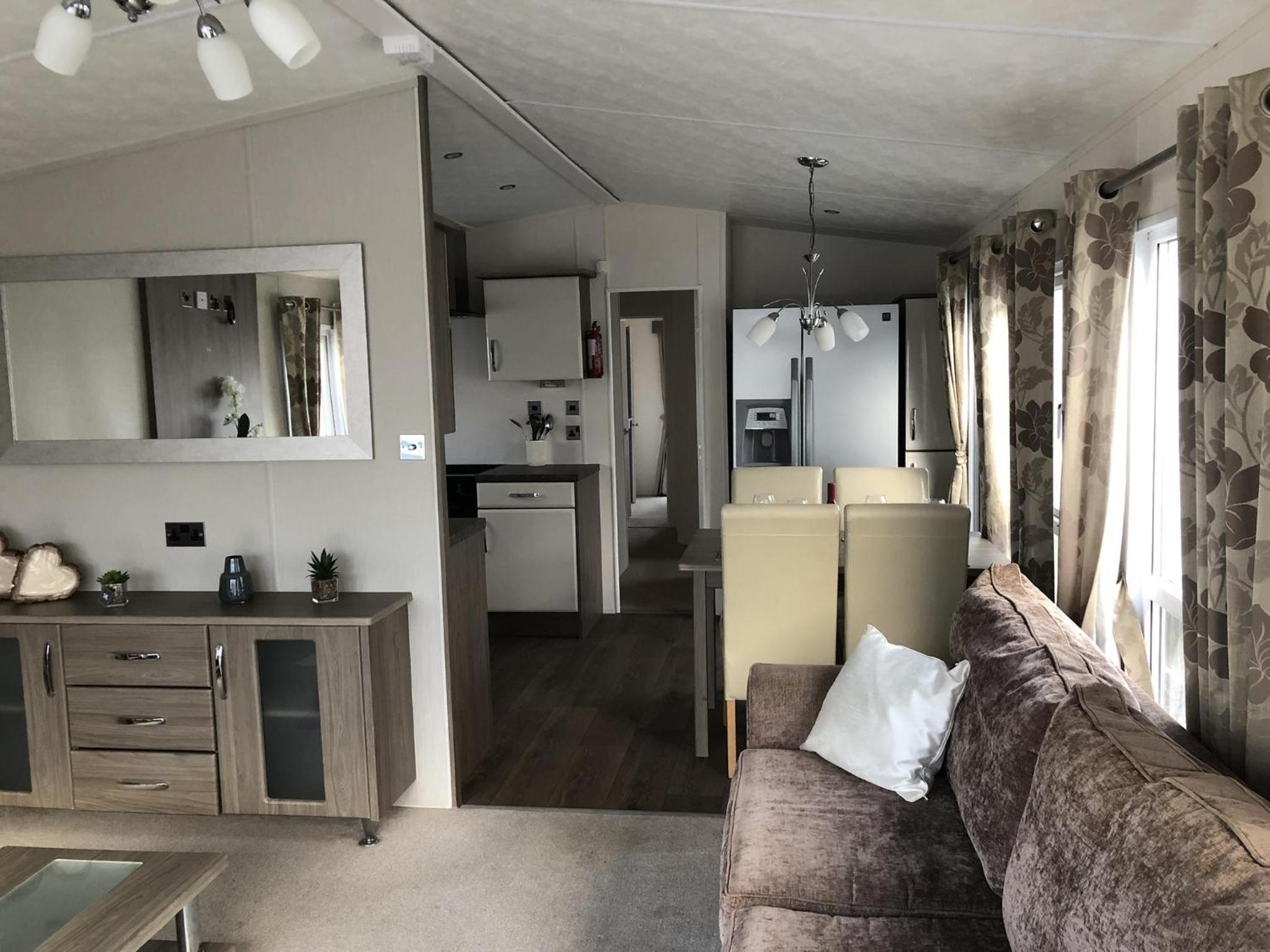 Beautiful Caravan With Decking At California Cliffs In Scratby Ref 50052L view 2
