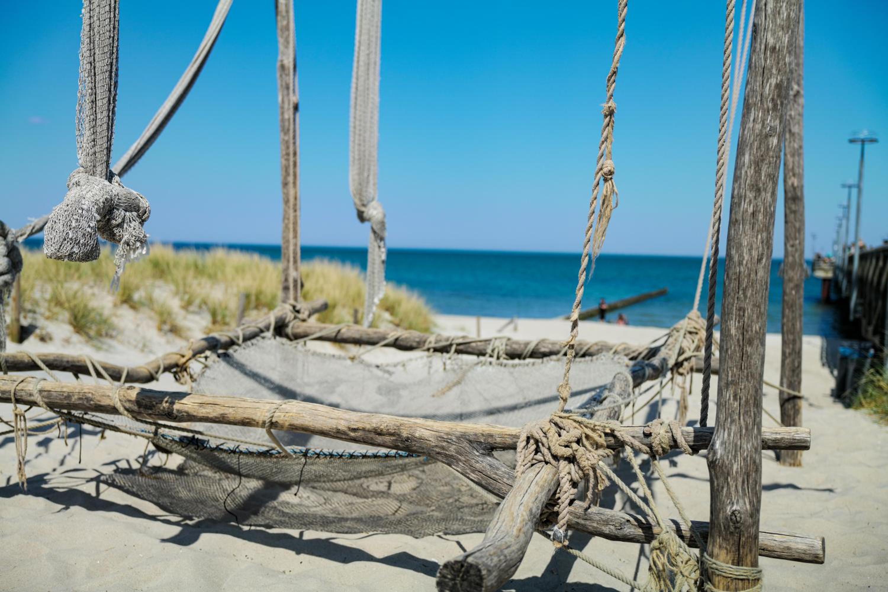 Ferienwohnungen Meerfarbig Zingst - HAUSTIERFREI -Terrasse mit Strandkorb oder Balkon - Glasfaser - Parkplatz - Fahrradschuppen - Waschtrockner - E-Ladesäu