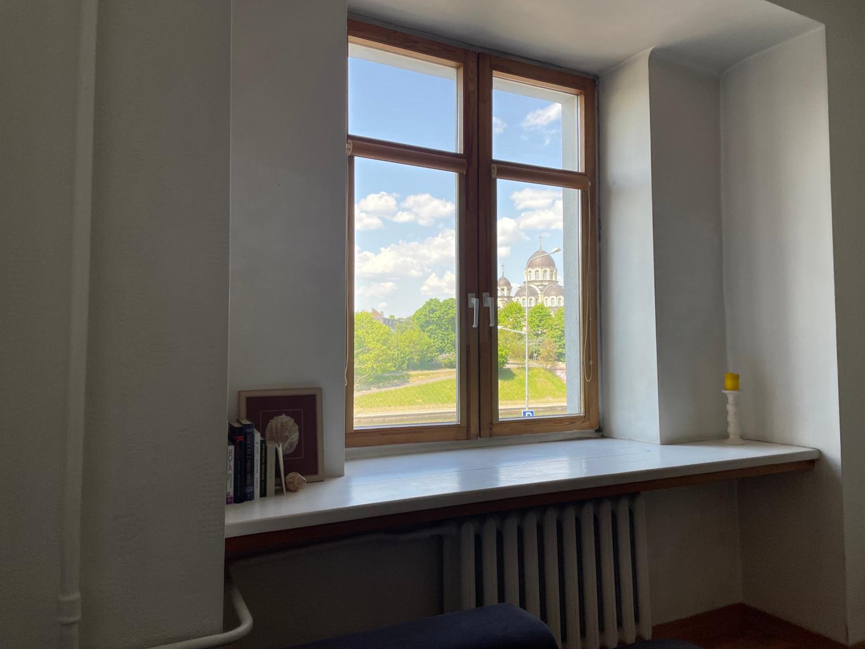 A cozy apartment with a wonderful view of the river in the old town of Vilnius view 4