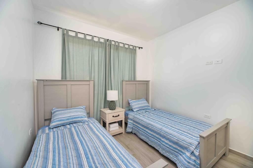 Cozy Beach Villa at The Shores 5 minutes from the beach