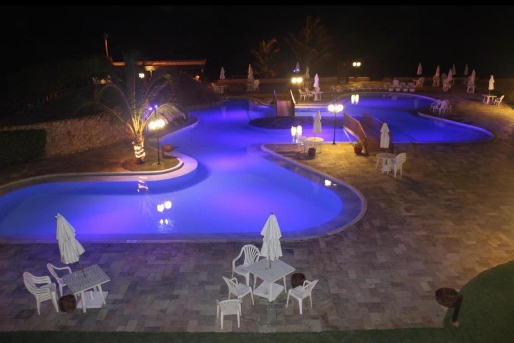 MARUPIARA SUITES- FLAT MURO ALTO