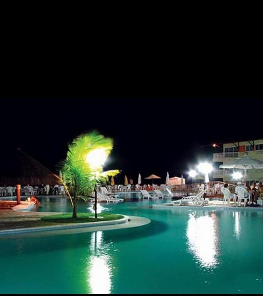 MARUPIARA SUITES- FLAT MURO ALTO