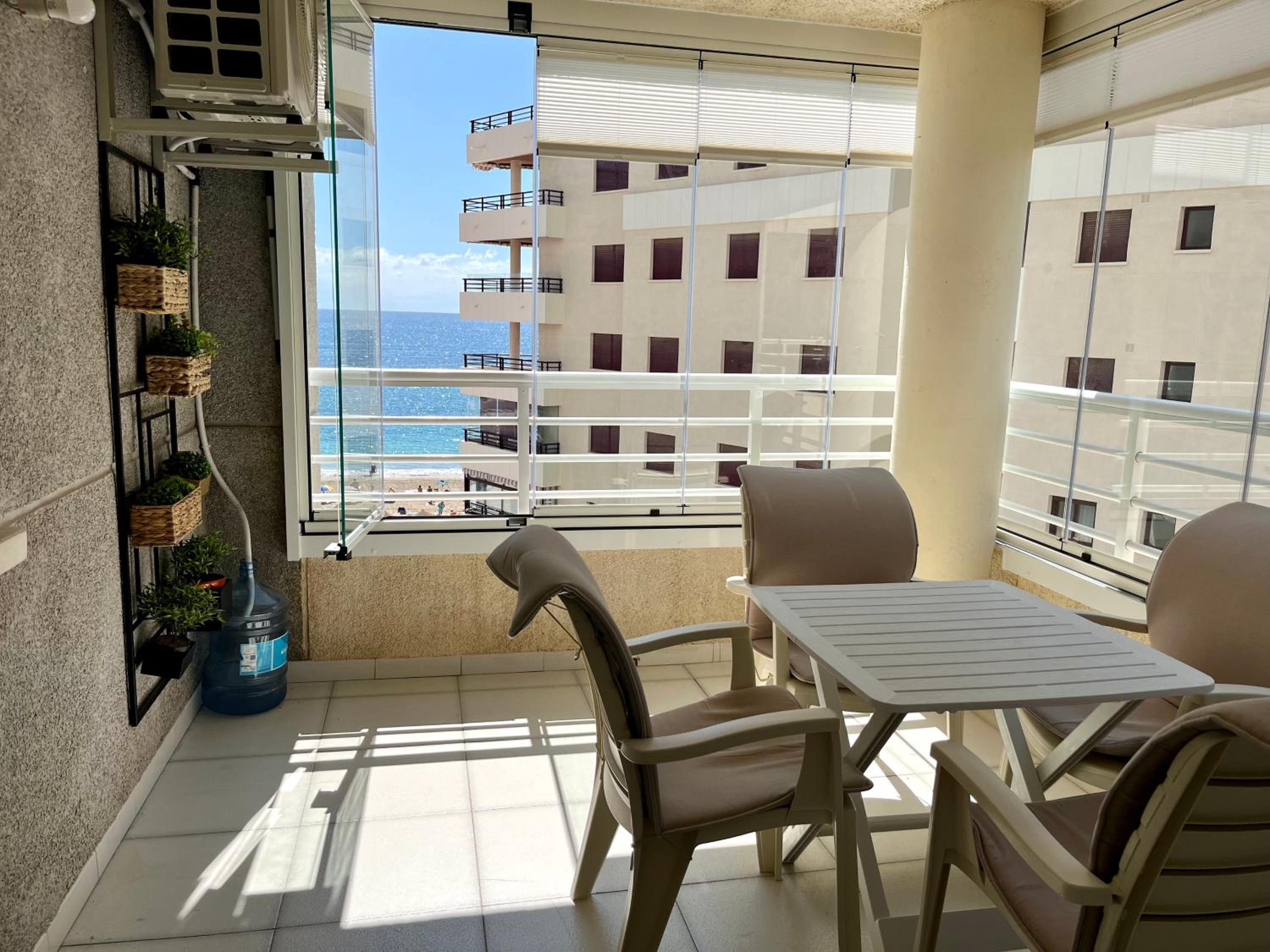 Modern apartment on the beach with pool
