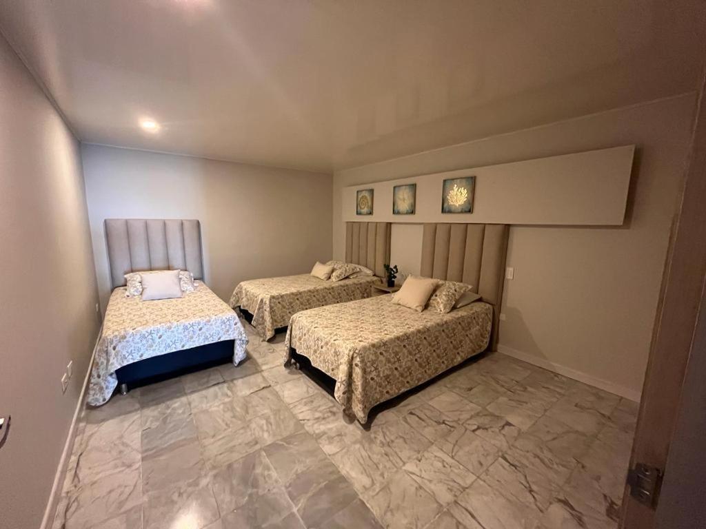Apartamentos con playa privada y vista al mar