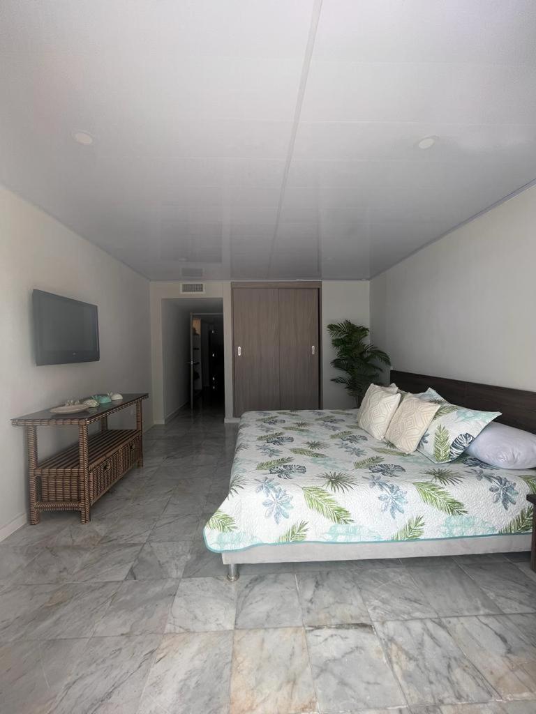 Apartamentos con playa privada y vista al mar