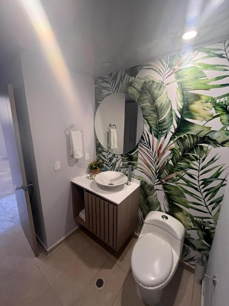 Apartamentos con playa privada y vista al mar