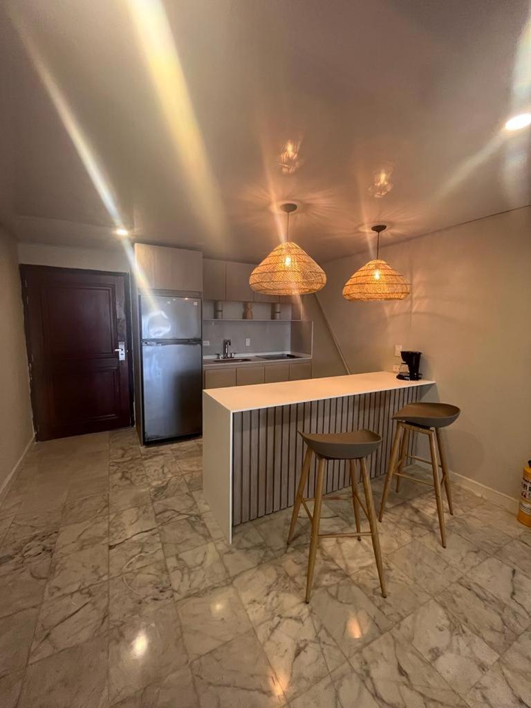 Apartamentos con playa privada y vista al mar