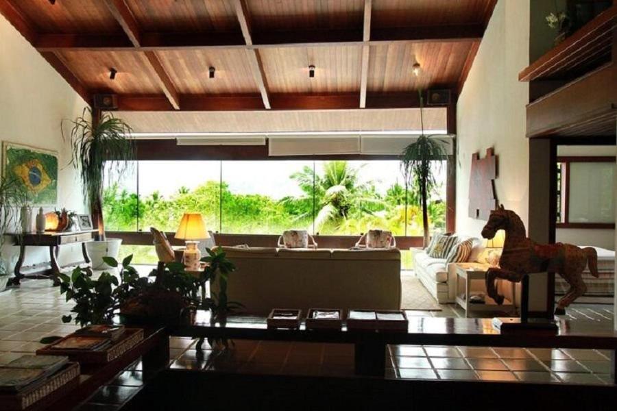 SMI012 Casa charmosa em condomínio à beira mar