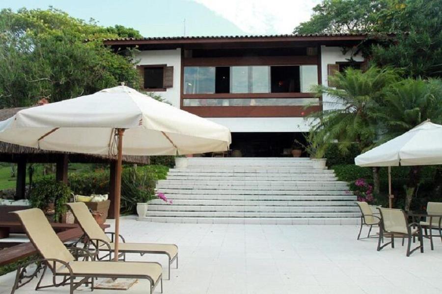 SMI012 Casa charmosa em condomínio à beira mar