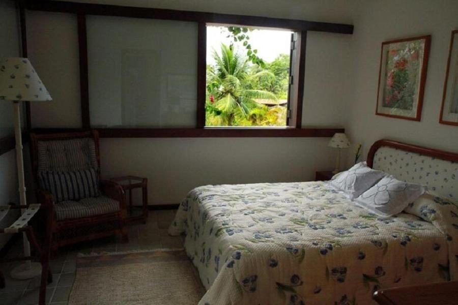 SMI012 Casa charmosa em condomínio à beira mar