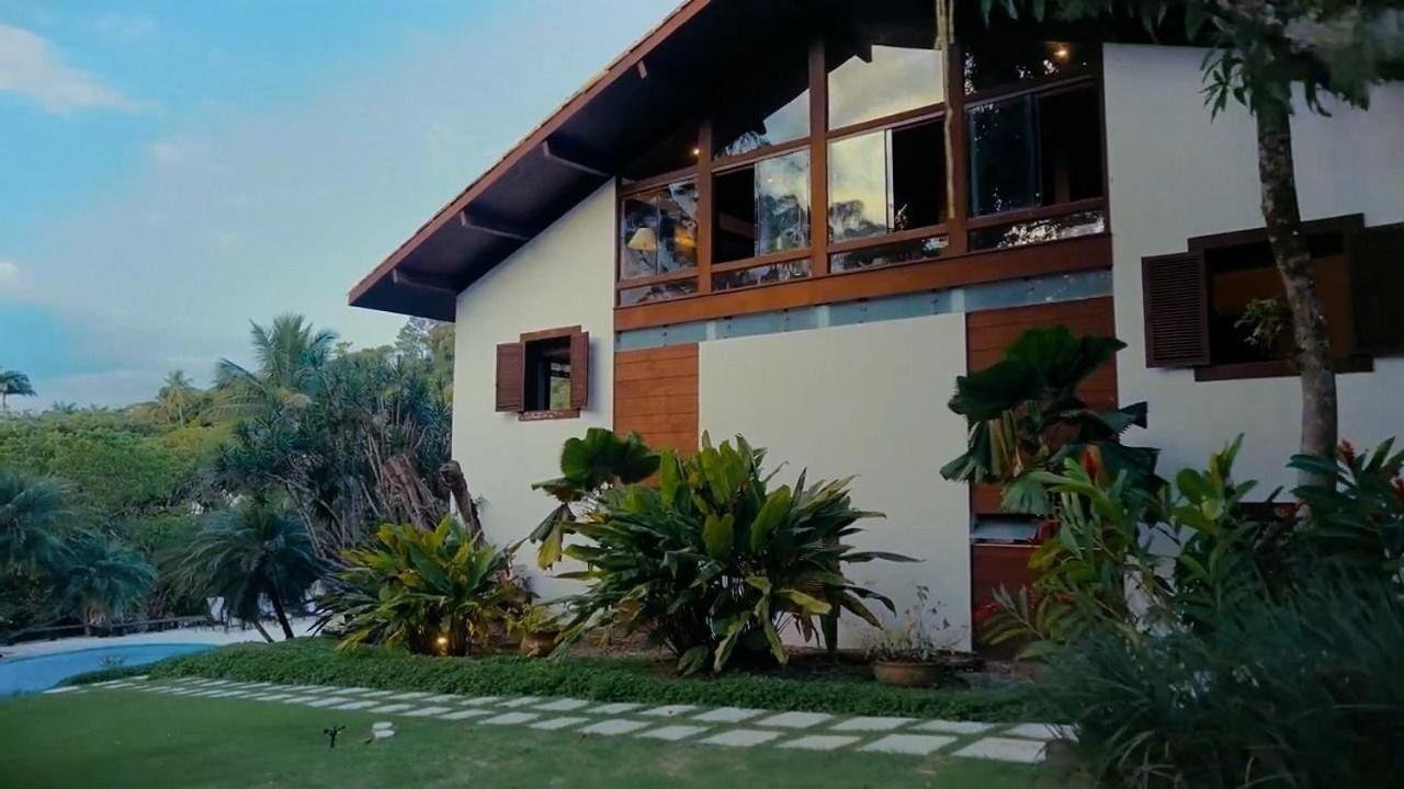 SMI012 Casa charmosa em condomínio à beira mar