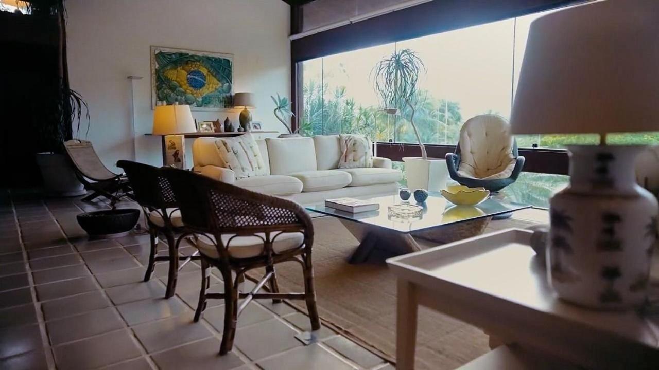 SMI012 Casa charmosa em condomínio à beira mar