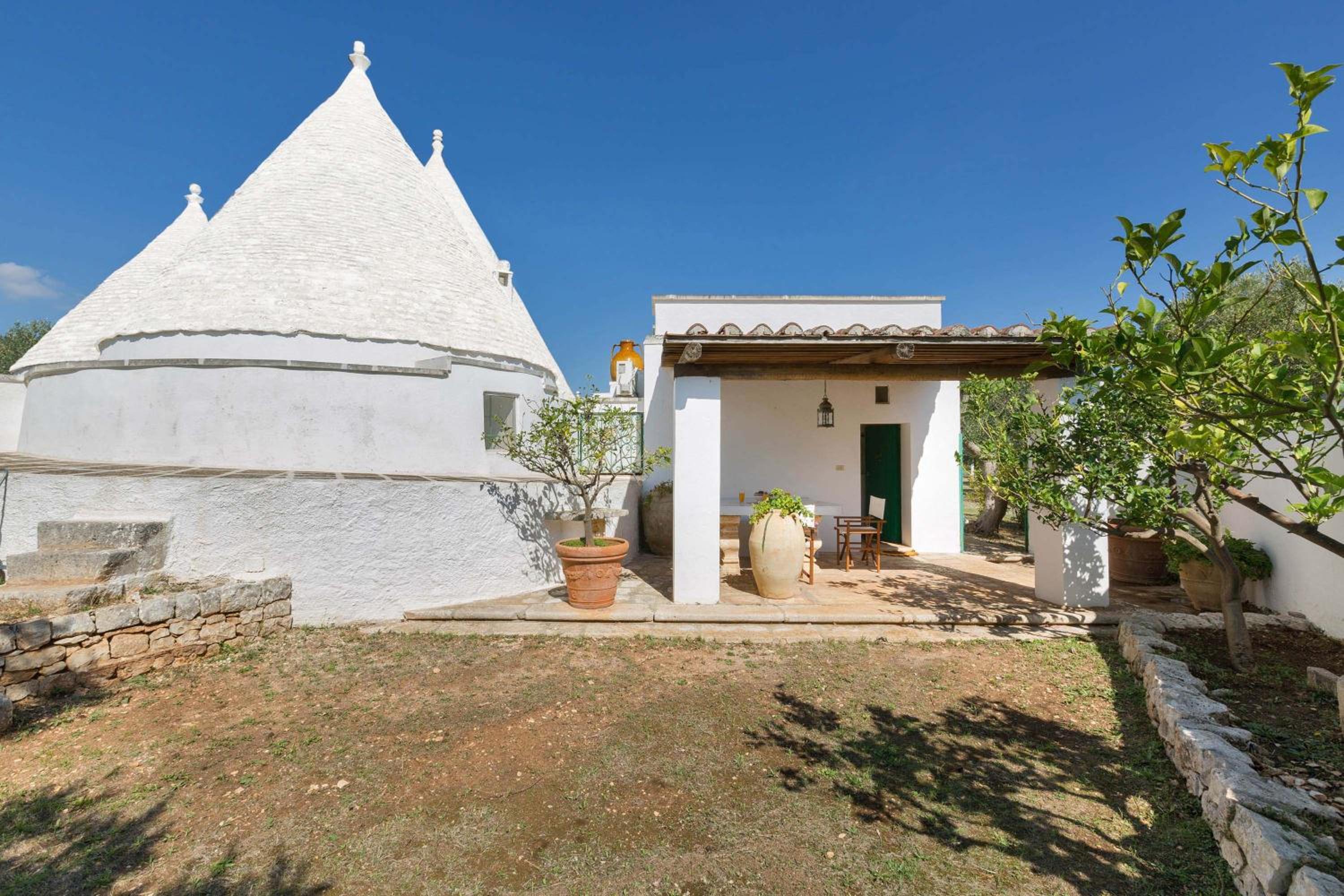 Trulli Il Cappero by Perle di Puglia