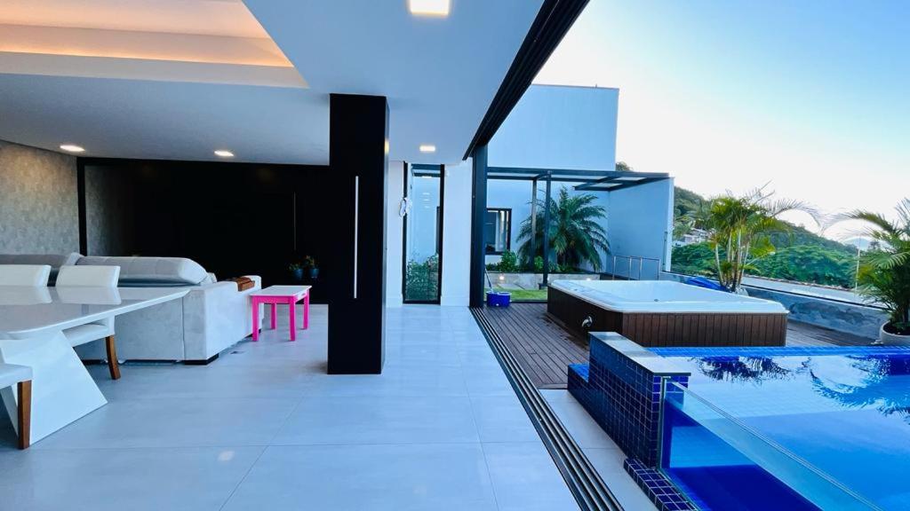Casa 3 quartos casal Alto Padrão Vista, SPA, Hidro e Piscina de vidro