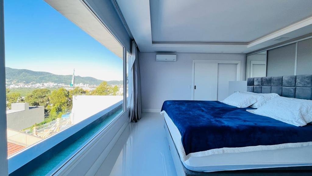 Casa 3 quartos casal Alto Padrão Vista, SPA, Hidro e Piscina de vidro
