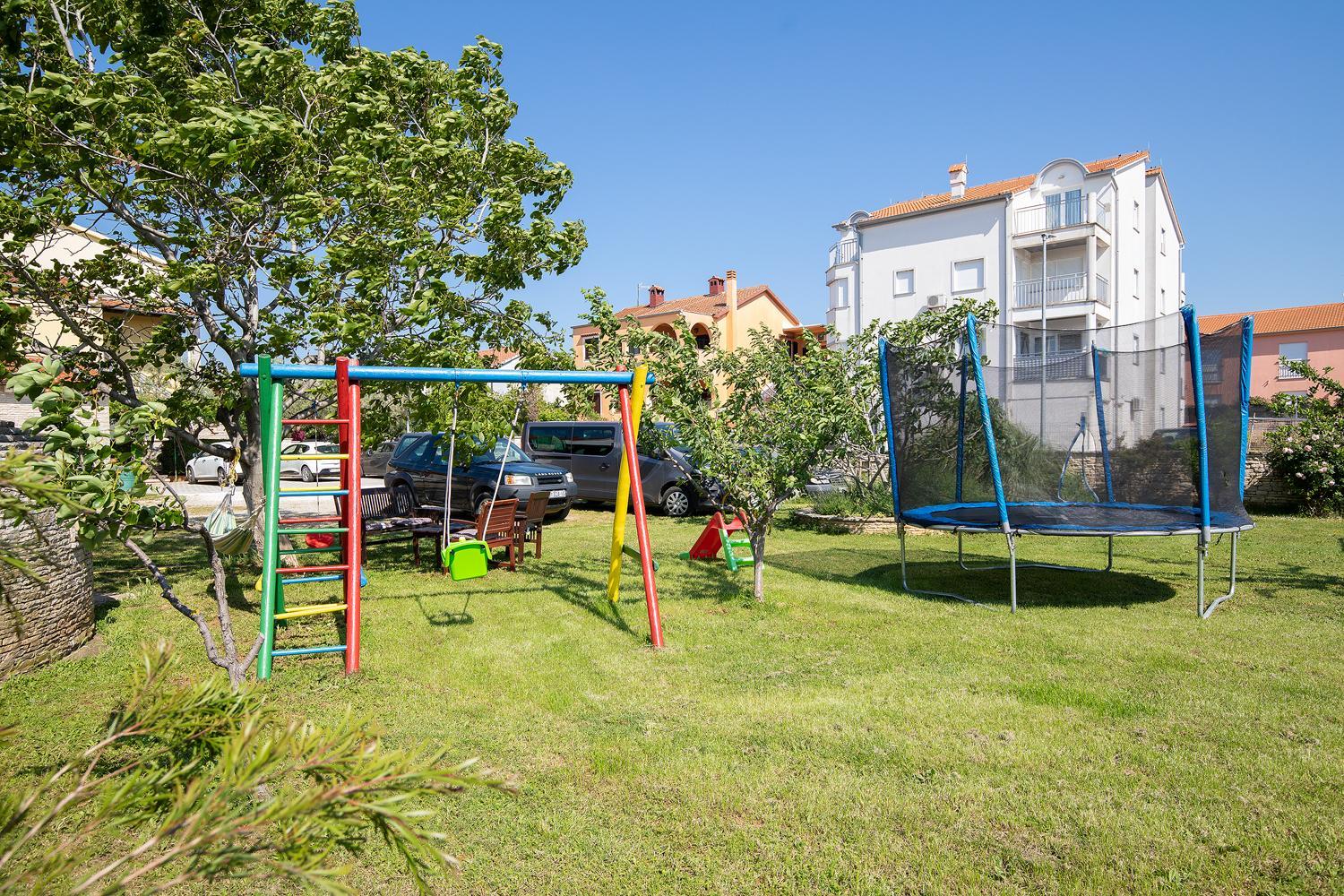 Apartments Dadic with parking & playground view 2