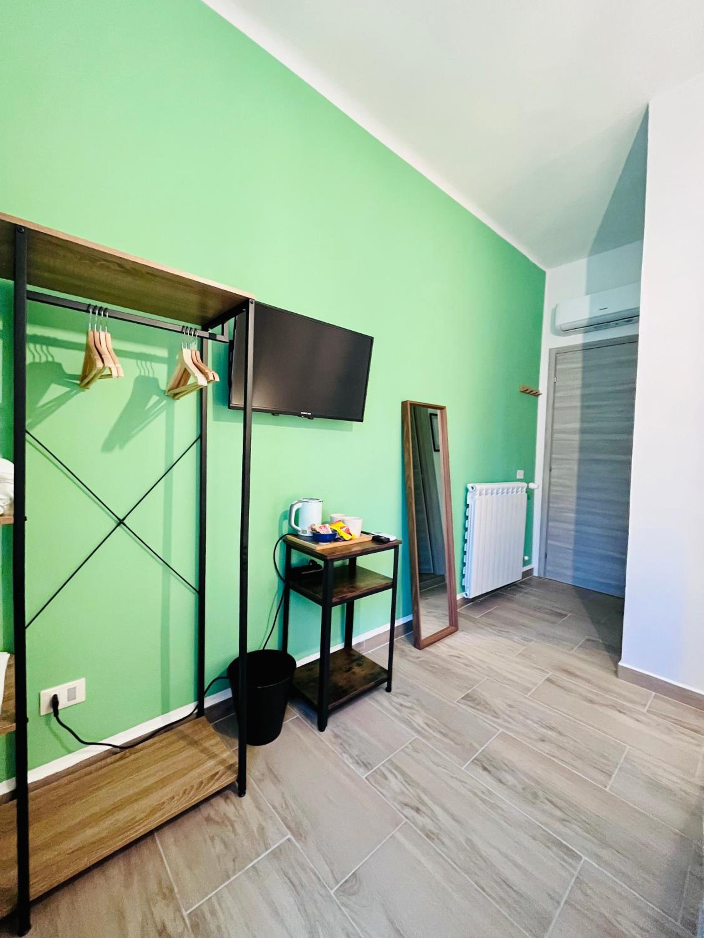 A Pisa con amore en Pisa — hotel room