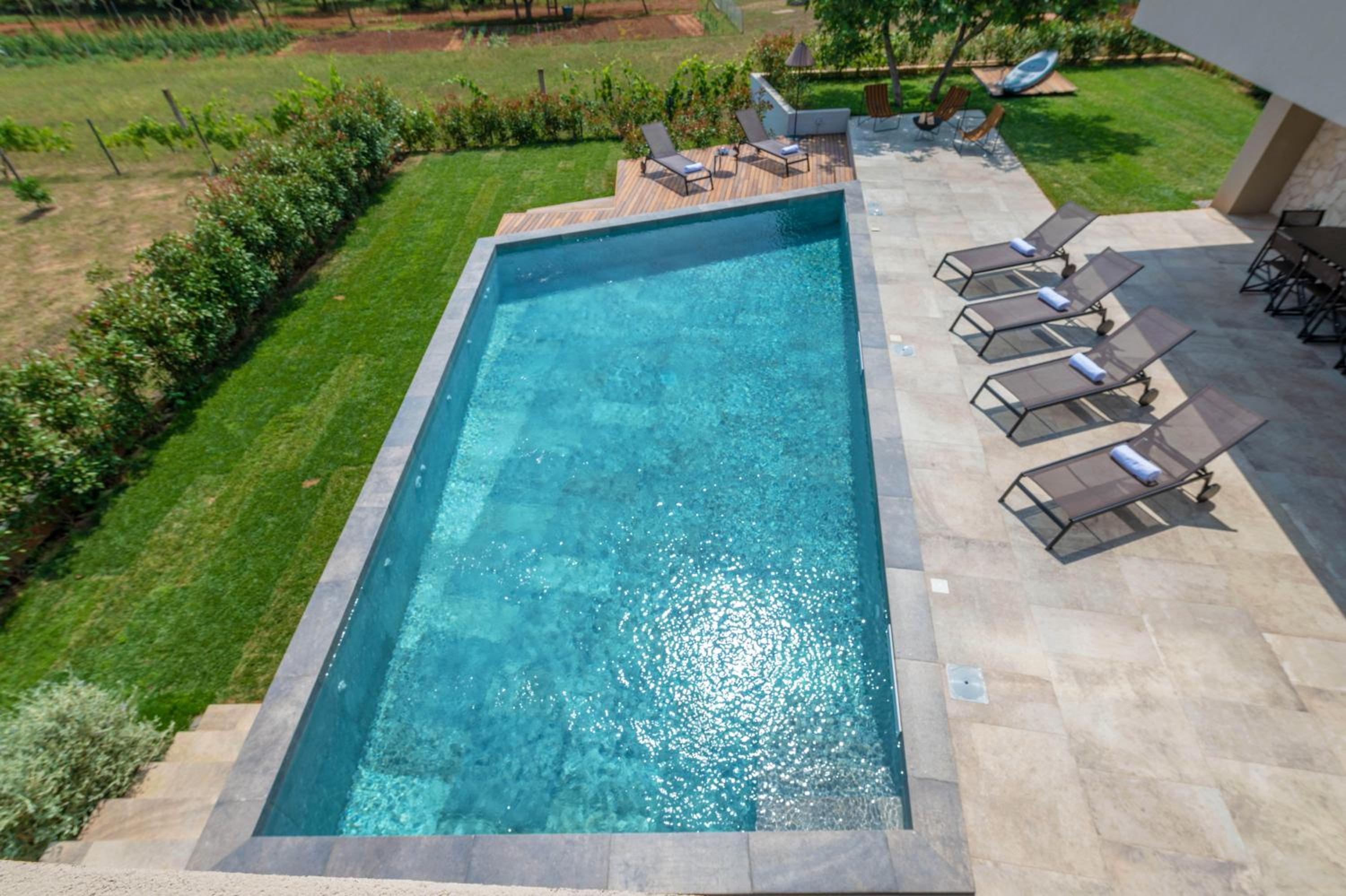 Luxury beachside villa with a pool and a sea view view 4