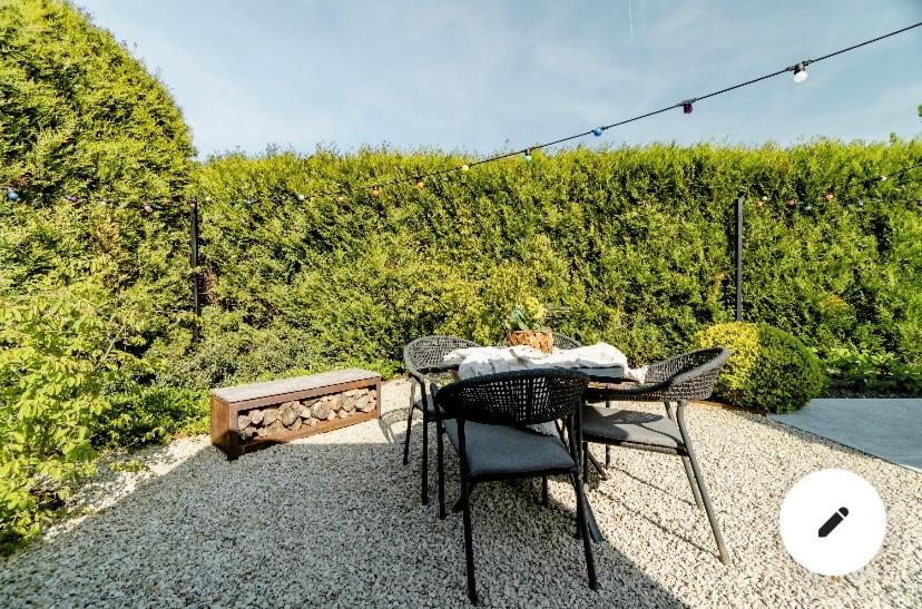 Roulotte du puits avec jacuzzi et sauna privatif