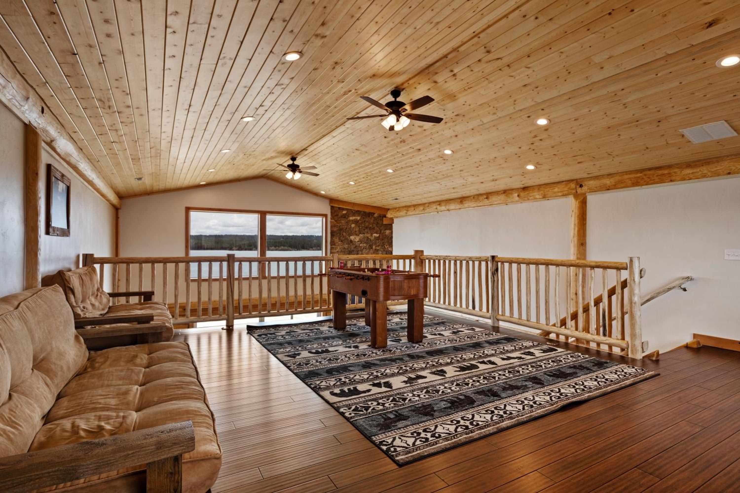 Stone Skipper Lodge by KABINO Waterfront Hot Tub Private Bath In Every Bedroom FirePit Mtn Views WiFi Grill view 4