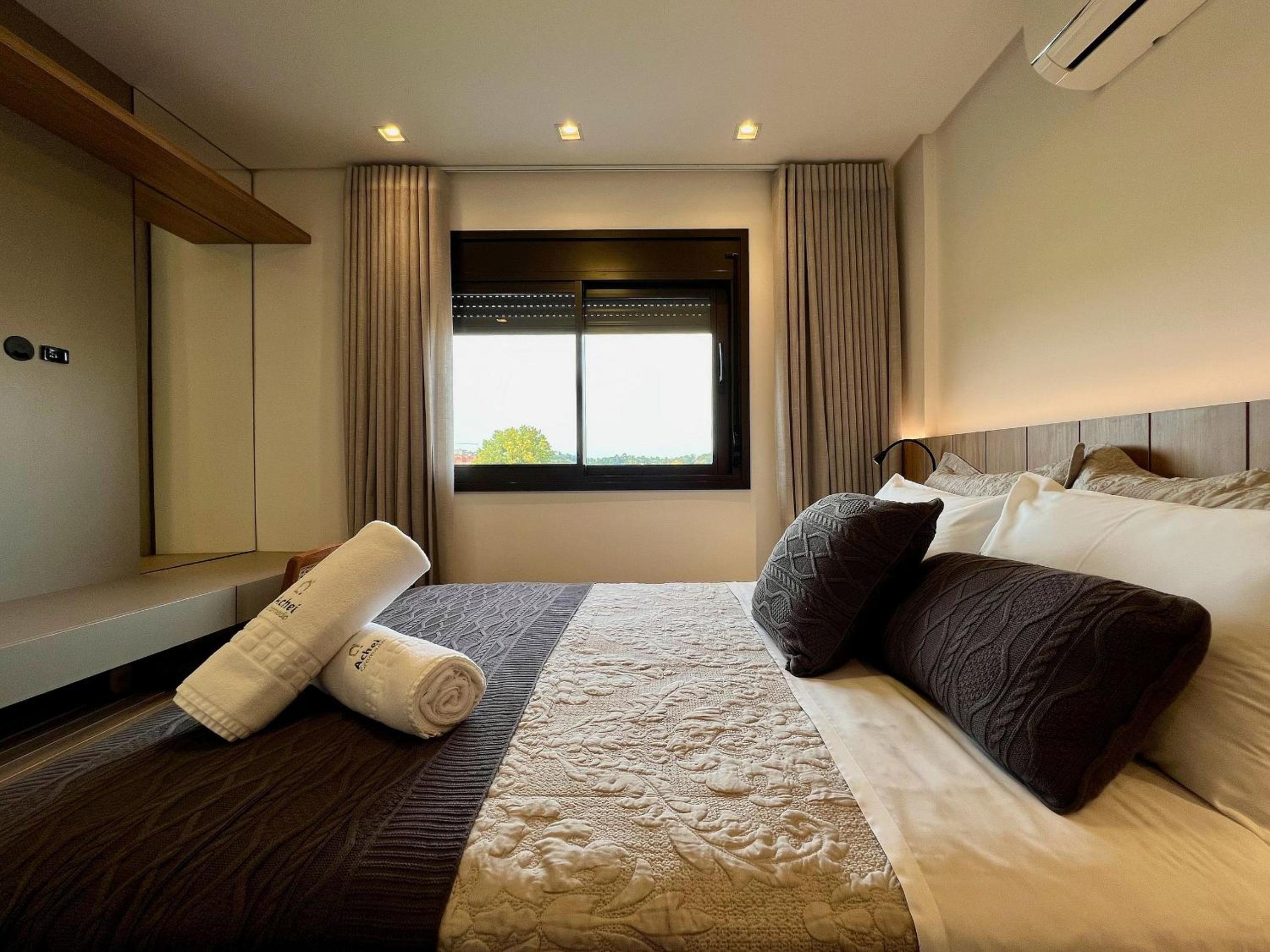 Apartamento Volo Class 2 Suítes Centro by Achei