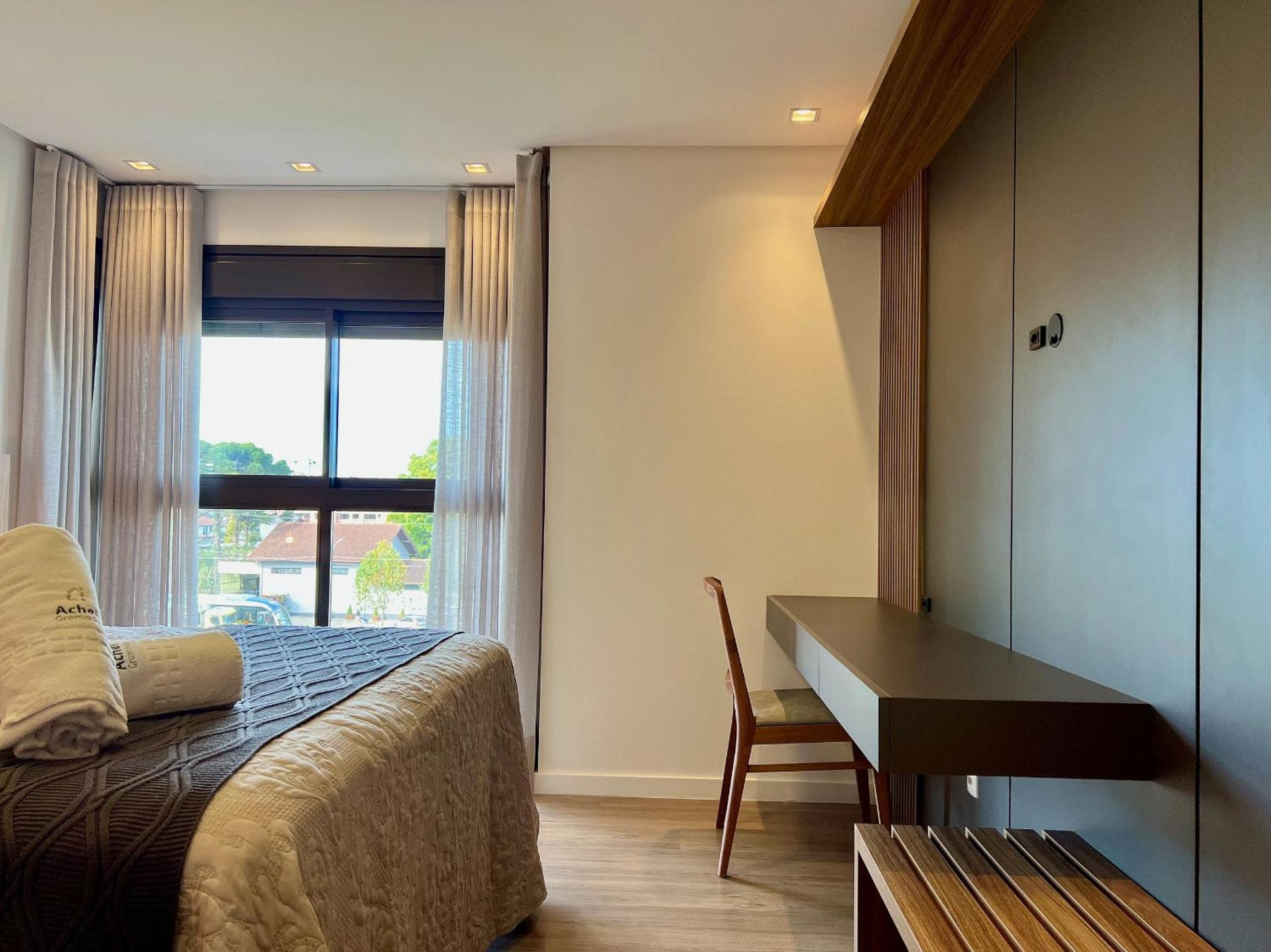 Apartamento Volo Class 2 Suítes Centro by Achei