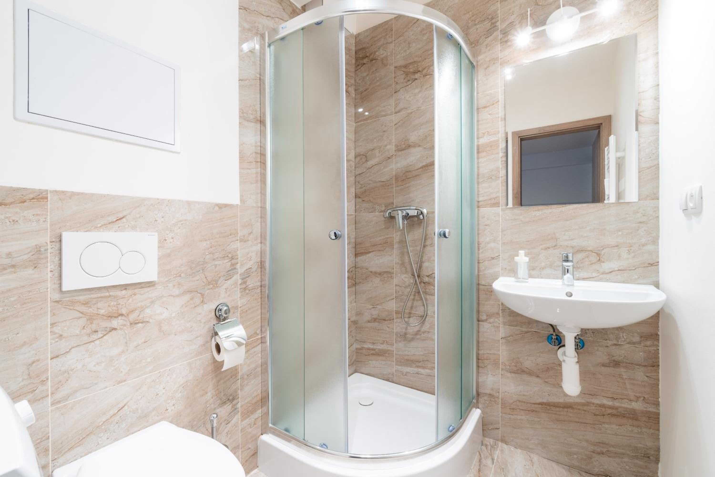 Brand new studio apartment # 42 in brand new building with free parking in the center