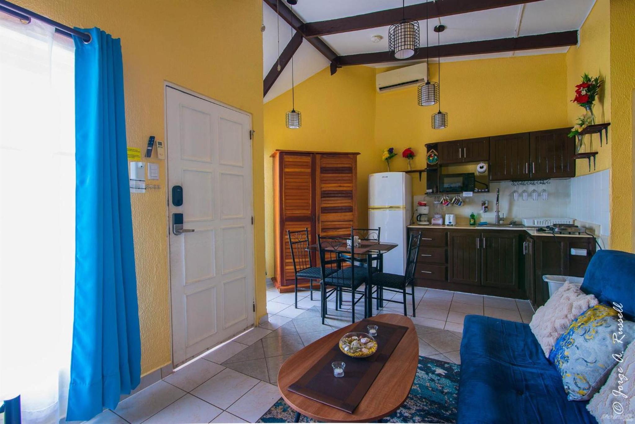 Centrally located in Jaco, walk to beach, beautiful pool! Each Villa Paradise is 1bd 1bath Condo Units sleep 5 or book both units and open connecting door 