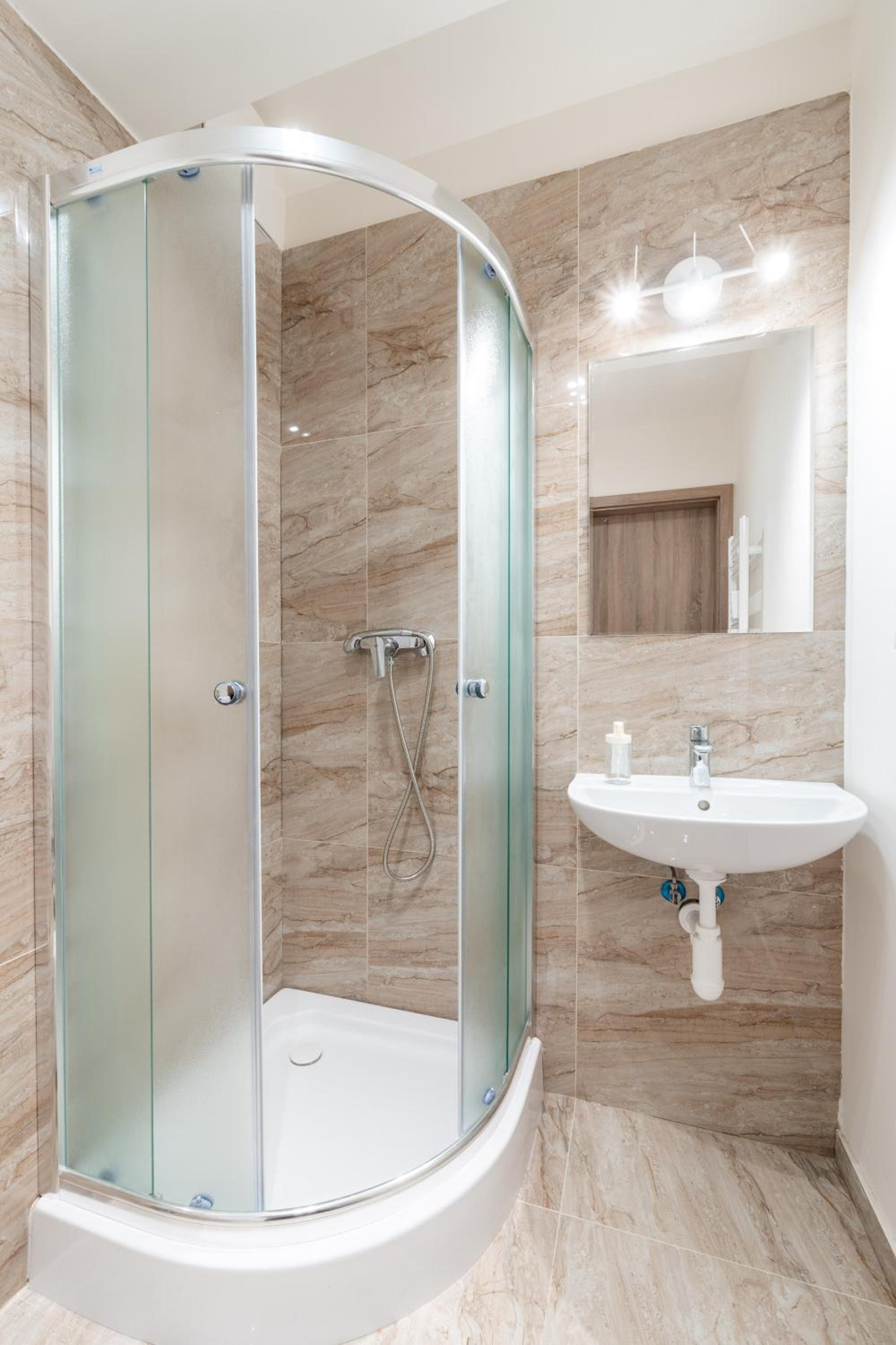 Studio brand new apartment #28 in new building with free parking in city center