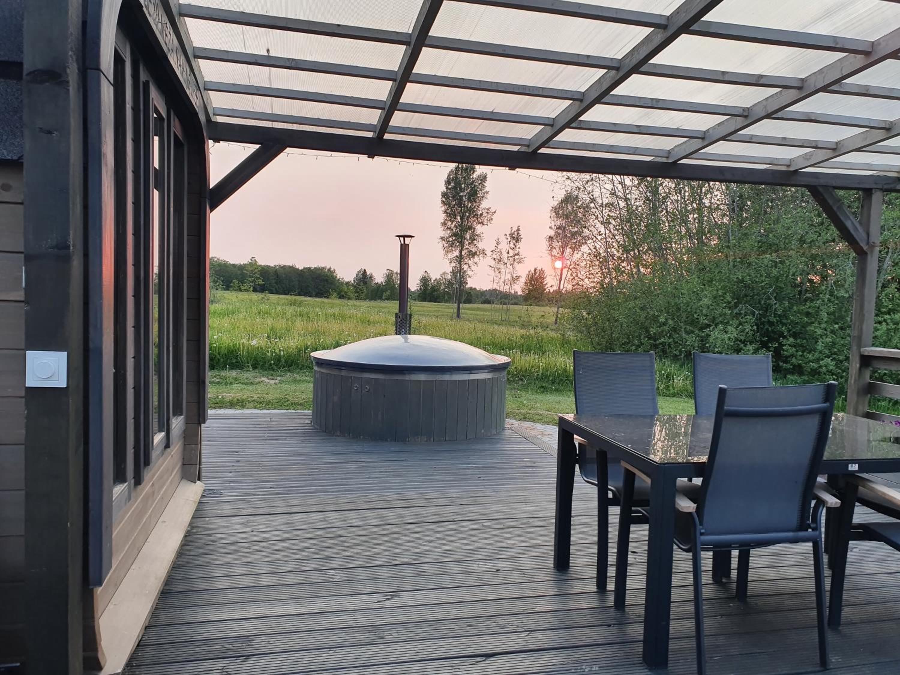 Purenes - Barrel shaped pod with hot tube view 4